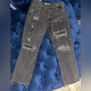 Blackish grey ripped jeans from Forever 21. Size US 29. Never worn.